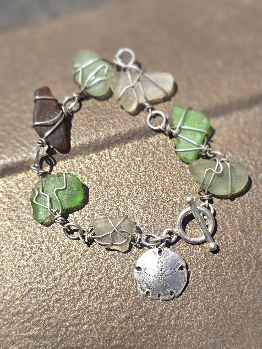 Artisan handcrafted 925 sterling silver wire wrapped tumbled sea glass sand doll
